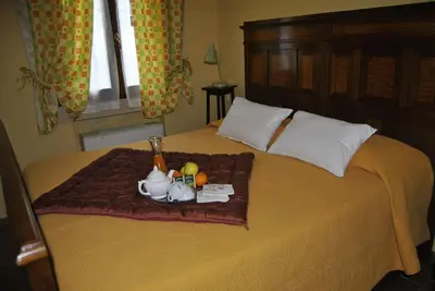 Letto o letti in una camera di Agriturismo Villa Greggio