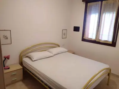 Letto o letti in una camera di Apartment in Rosolina Mare 27385