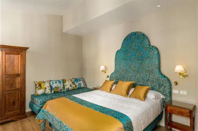 Letto o letti in una camera di Hotel Villa Rosa