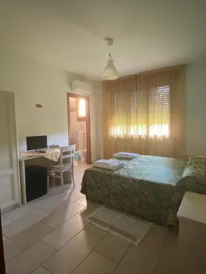 Letto o letti in una camera di Agostini Daniela B&B