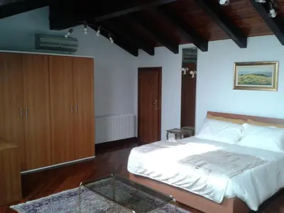 Letto o letti in una camera di Alle Grazie