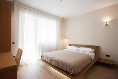 Letto o letti in una camera di Casa di Lucia