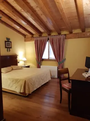 Letto o letti in una camera di Agriturismo Vigneto Vecio