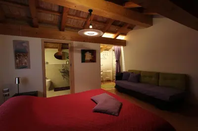 Letto o letti in una camera di LE TRE ARTI B&B