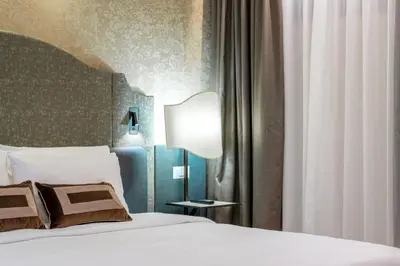 Letto o letti in una camera di Acca Hotel