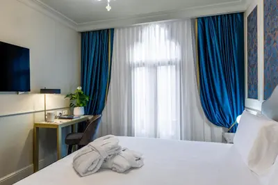 Letto o letti in una camera di Hotel Palazzina Sardi