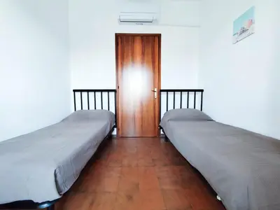 Letto o letti in una camera di Diplomatic Fronte Mare