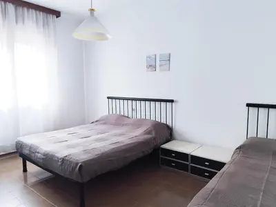Letto o letti in una camera di Diplomatic Fronte Mare