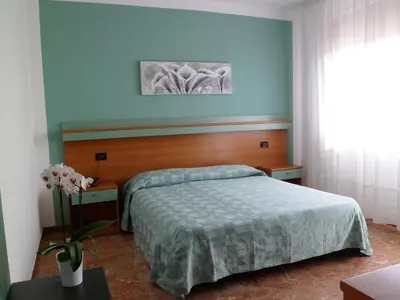 Letto o letti in una camera di Hotel Europeo
