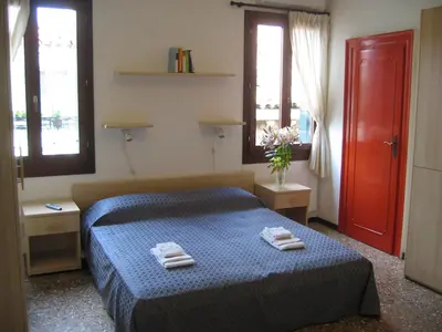 Letto o letti in una camera di B&B Santo Stefano - Venezia
