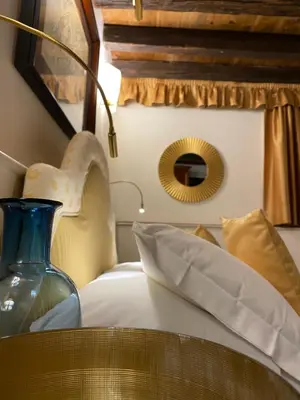 Letto o letti in una camera di Ca' San Giorgio B&B