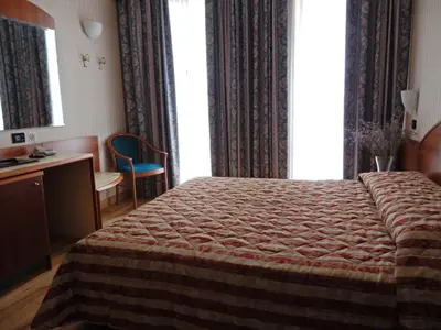 Letto o letti in una camera di Hotel Brennero
