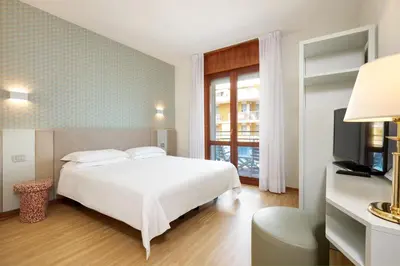 Letto o letti in una camera di Hotel Croce Di Malta