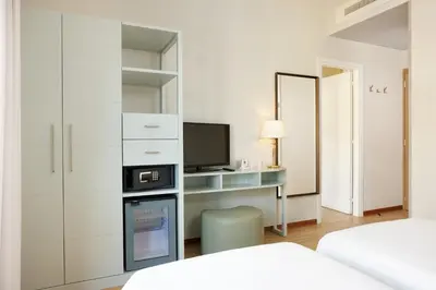 Letto o letti in una camera di Hotel Croce Di Malta