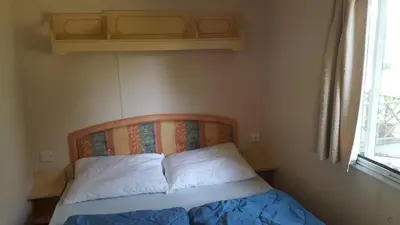 Letto o letti in una camera di Sunny Beach Mobile Homes Rosapineta