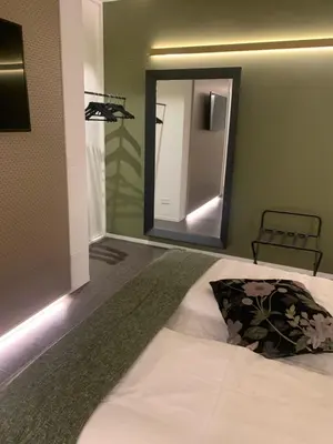 Letto o letti in una camera di Tiepolo Charme Houses