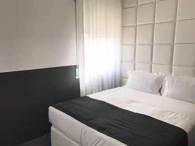 Letto o letti in una camera di Hotel Pex Padova
