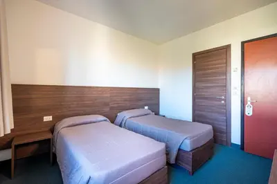 Letto o letti in una camera di Hotel Albatros