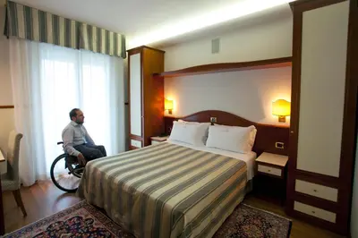 Letto o letti in una camera di Hotels Vidi Miramare & Delfino