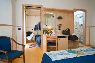 Letto o letti in una camera di Hotels Vidi Miramare & Delfino