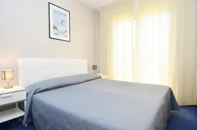 Letto o letti in una camera di Ute Hotel