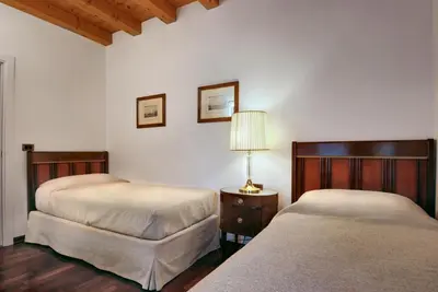 Letto o letti in una camera di Villa Dacri