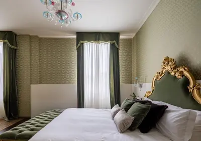 Letto o letti in una camera di Hotel La Residenza