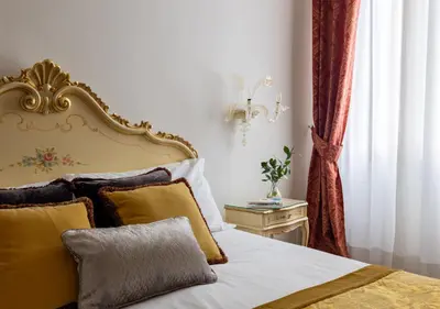 Letto o letti in una camera di Hotel La Residenza
