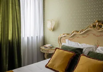 Letto o letti in una camera di Hotel La Residenza