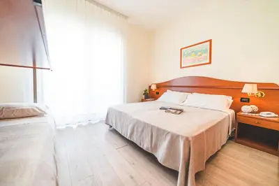 Letto o letti in una camera di Hotel Sole