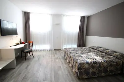 Letto o letti in una camera di Resilienza