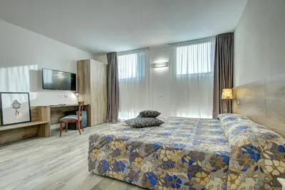 Letto o letti in una camera di Resilienza