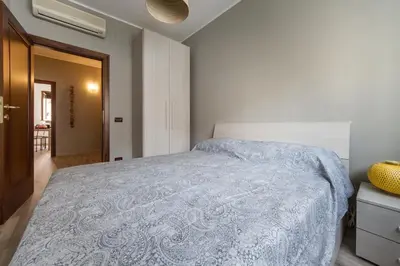 Letto o letti in una camera di CARDINAL MASSAIA VENICE APARTMENT