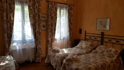 Letto o letti in una camera di Hotel Il Casolare
