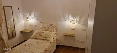 Letto o letti in una camera di Hotel Il Casolare