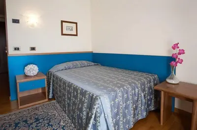 Letto o letti in una camera di Hotel Spresiano
