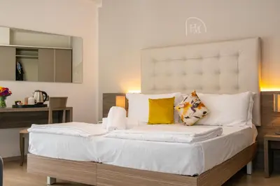 Letto o letti in una camera di Hotel Delle Mimose