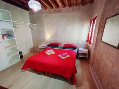 Letto o letti in una camera di Cà Lirica