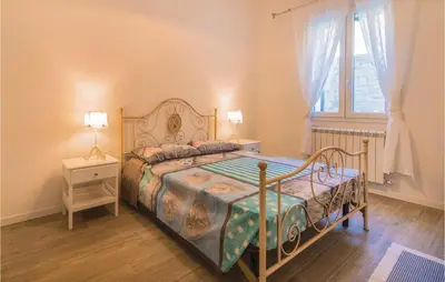 Letto o letti in una camera di Awesome Apartment In Valnogaredo Pd