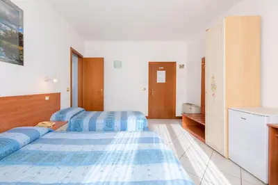 Letto o letti in una camera di Hotel New Aurora Venice