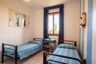 Letto o letti in una camera di Hotel Il Lato Azzurro - Isola di Sant'Erasmo - NO VEHICLES ACCESS