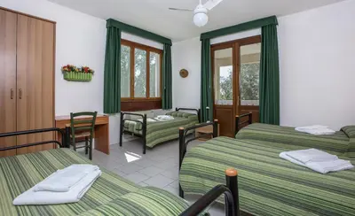 Letto o letti in una camera di Hotel Il Lato Azzurro - Isola di Sant'Erasmo - NO VEHICLES ACCESS