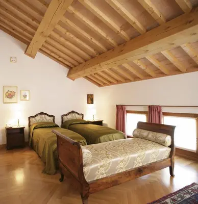 Letto o letti in una camera di Villa Busta Hotel