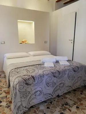 Letto o letti in una camera di Ca' Zuliani Rooms