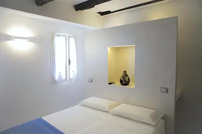 Letto o letti in una camera di Ca' Zuliani Rooms