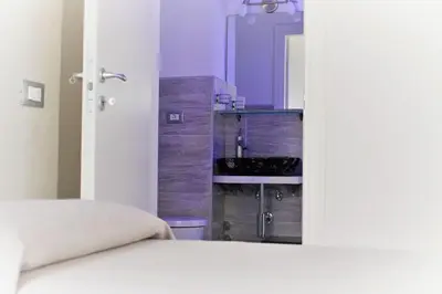 Letto o letti in una camera di Ca' Zuliani Rooms