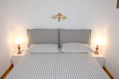 Letto o letti in una camera di Marty Guest House Venezia