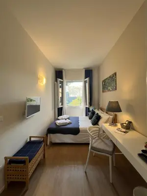 Letto o letti in una camera di Villa Due Giardini