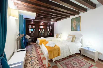 Letto o letti in una camera di Ca' del Carro Family Apartment