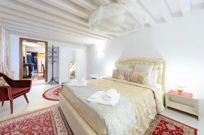 Letto o letti in una camera di Ca' del Carro Family Apartment